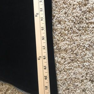 Black rough out equestrian chaps.